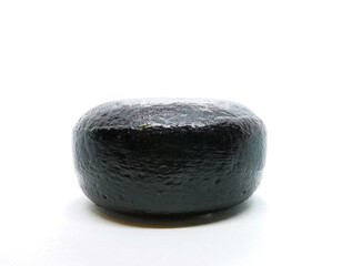 Fototapeta premium Wax-coated cheese wheel picture taken in a lightbox