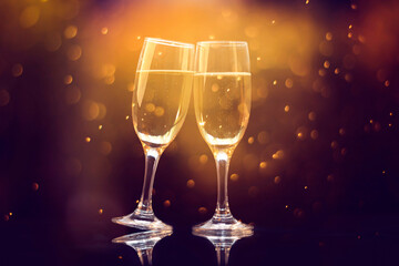 New Year's at midnight - Champagne with holiday lights