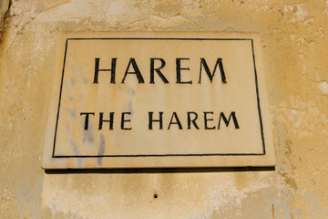 Stone old sign for The Harem.