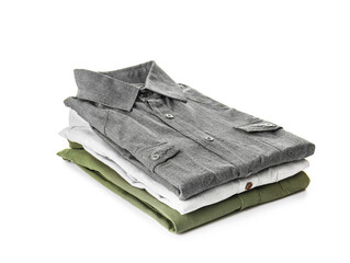 Stack of folded male shirts on white background