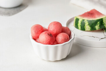 Tasty watermelon balls in bowl on table