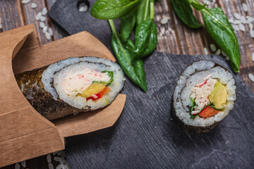 Still life. Japanese cuisine- roll in a package