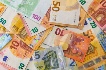Pile of euro banknotes as background