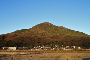 Mt. Tsukuba in Gentle Winter Sunlight with Blue Sky and Fallow Fields