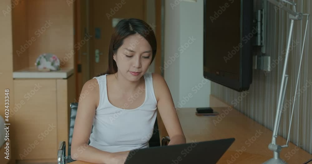 Wall mural Woman work on computer at room