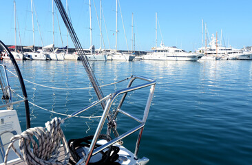 Sail with the sailboat in the calm and warm Mediterranean sea. The horizon is before the eyes.