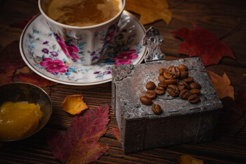 Still life- autumn motif. Breakfast- cup of coffee is on the table