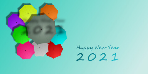 Top view blue background with umbrellas and "happy new year 2021" text