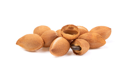 velvet tamarind fruit ( Dialium cochinchinense) isolated on white background