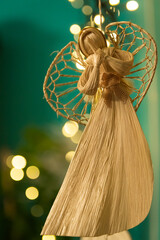 christmas angel decoration hang on bokeh background