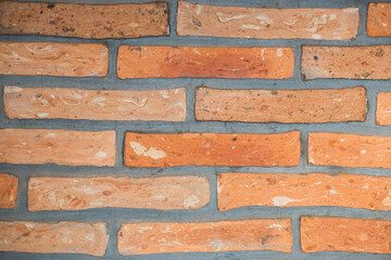 Fototapeta premium close-up of a red brick wall. for invitation or event card