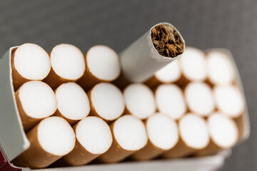 Cigarette close-up. Quitting smoking is the single easiest way to avoid heart disease.