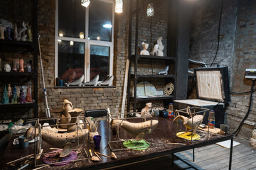 Clay whale on a stand in a pottery workshop