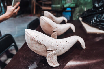 Ceramic whales in a pottery workshop, finished product