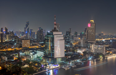 Aerial view of colorful lighting from building along Chaophraya River