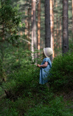 girl standing in a Swedish forest