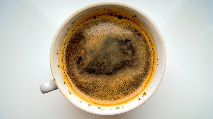 A cup of coffee. Ground brewed coffee.