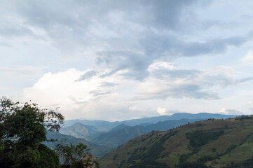 Beautiful landscape view with mountains and sky at sunset.