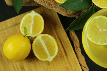 Fototapeta na wymiar Group of lemons with leaves, isolated on background