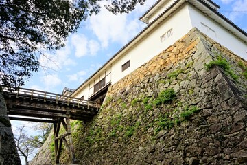Fototapeta na wymiar Tenbin Yagura gate and Rouka bridge at Hikone Castle in Hikone City of Shiga, Japan - 滋賀 彦根城の天秤櫓 