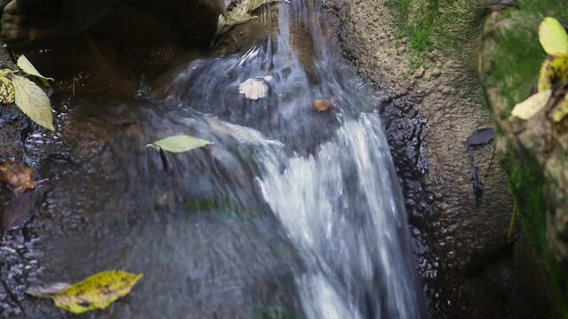 Travelling of Waterfall detail from Argens river in autunm season in Cotignac, Provence, France