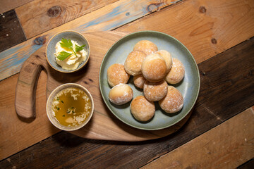 A delicious bowl of garlic bread rolls