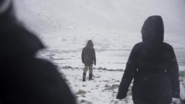 Group of people walking during Norway blizzard