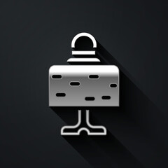 Silver Magic ball on table icon isolated on black background. Crystal ball. Long shadow style. Vector.