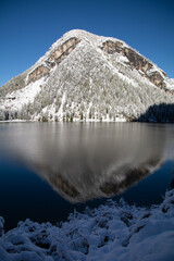 Fototapeta premium Lake Prags - first snow in a winter wonderland