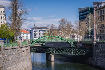 Naklejka premium Pedestrian bridge and U4 underground line bridge over Wien River and in Vienna capital city, Moldova