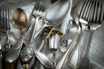 Silver dishes on old background