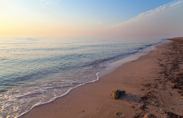 Sea beach at sunrise. Azov sea.