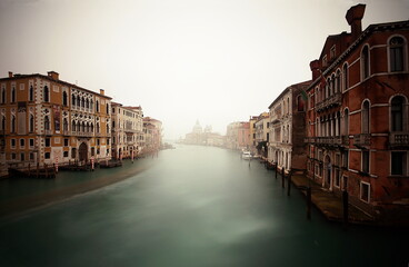 Travel Venice, foggy grand canal with old houses, city trip