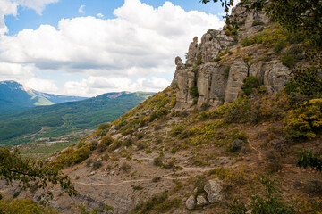 View on a green valley with mountain background