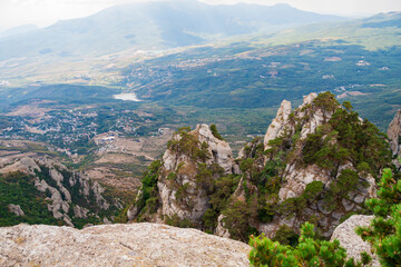 Fototapeta na wymiar View on a green valley with mountain background