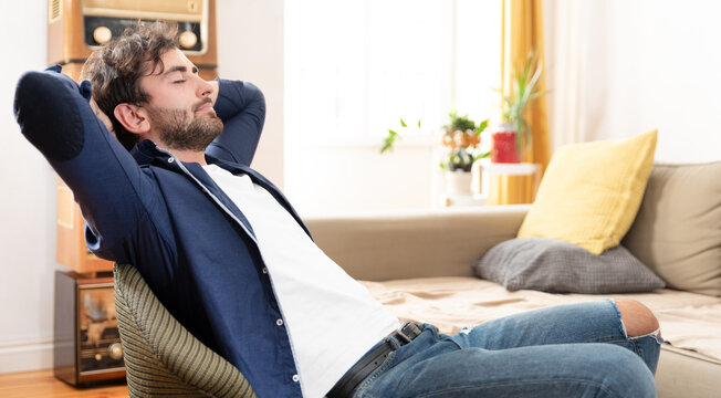 Young Man Relaxing In His Chair