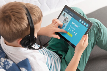 Remote learning concept with boy using laptop