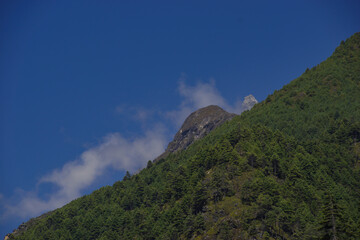 Peak surrounded with clouds from Everest view point before Namche Bazar on the Everest base camp trek. 