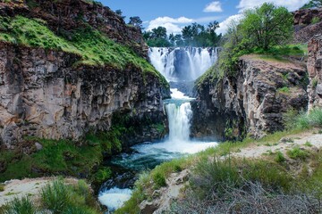 One of the most spectacular waterfalls in Oregon, White River falls, in beautiful sunny day