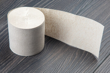 toilet paper on wooden background