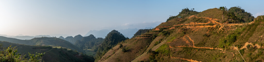 A panoramic evening view over the mountains, hills and rice terraces at Moc Chau, Son La Province, in northern Vietnam