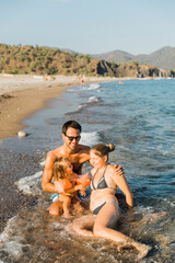 Family having fun in sea