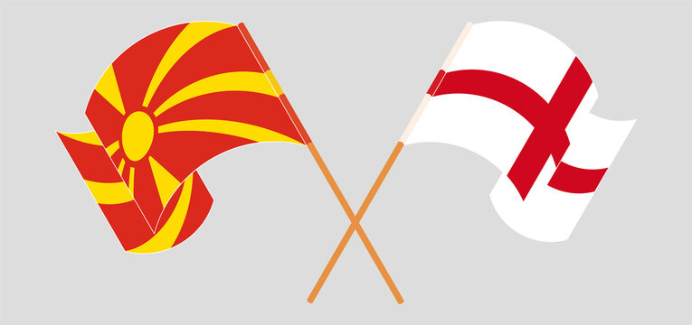 Crossed and waving flags of North Macedonia and England