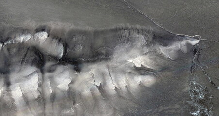 Unstoppable stupidity, United States, abstract photography of relief drawings in  fields in the...