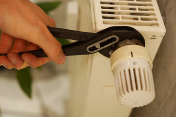 Fixing a Heat regulator of radiator with a wrench