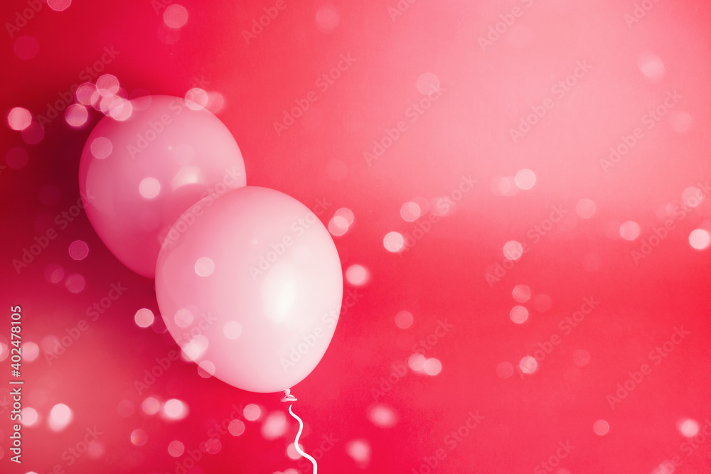 Poster bokeh blur of glitter over pink balloons with red background for valentine's day card.