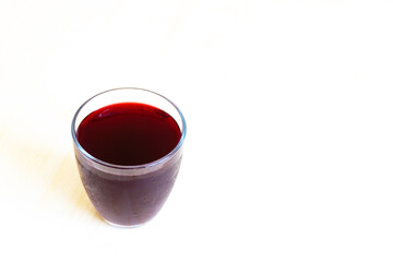 A glass of red juice