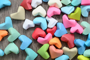 Colorful origami hearts background