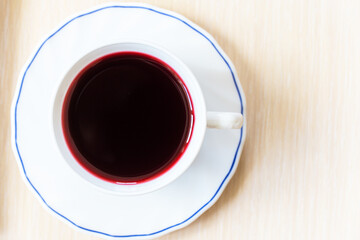A cup of red juice