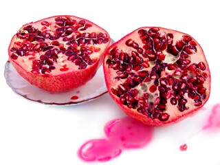 pomegranate fruits and juice close up